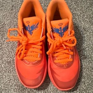 Puma M.E.L.O. Kids Orange Basketball Sneakers with Blue Accents